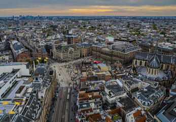 Stunning aerial view of Koninklijk Paleis - The Royal Palace in Amsterdam showcasing its iconic architecture, the iconic Town squareand vibrant cityscape.