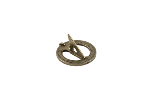 Antique brass sundial with a traditional design resting on a smooth surface, showcasing intricate detailing and craftsmanship