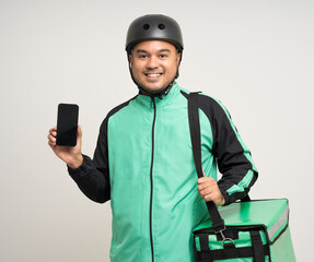 Young asian rider wearing green jacket uniform and bike helmet various action with delivery box. Male delivery service worker. Courier and shipping food service to customer online application