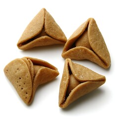 Four triangular cookies arranged on a clean white background surface