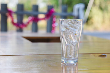 White plastic ice bucket on the table