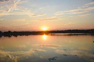 Orange sky with clouds at sunset