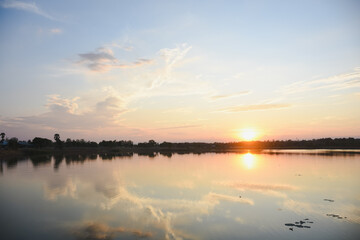 Orange sky with clouds at sunset