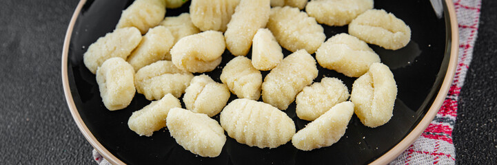Gnocchi tasty fresh delicious gourmet food background table rustic food top view copy space keto and paleo diet vegetarian and vegan food