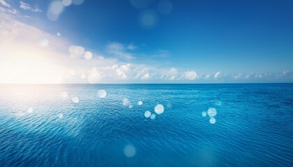 the smooth natural blue water background with bokeh abstract on the sea or ocean vintage and soft colored blur