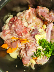 fresh rabbit meat with vegetables cooking