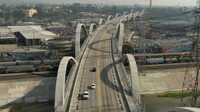 Aerial shot of Los Angeles. Sixth Street Viaduct bridge, busy industrial area, industry buildings