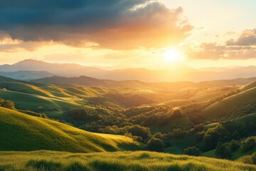 Naklejka premium Stunning Sunset Over Rolling Green Hills and Distant Mountains