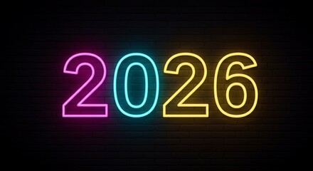 Vibrant neon 2026 numbers glowing in pink, blue, and yellow against a dark brick wall background, creating new year festive ambiance.