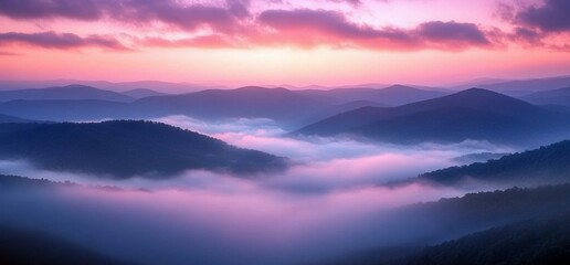 Obraz premium Misty mountains at sunrise, painted pink and purple hues