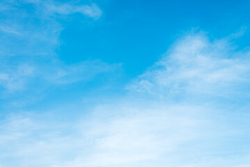 Fototapeta premium Sunshine clouds sky during morning background. Blue,white pastel heaven,soft focus lens flare sunlight. Abstract blurred cyan gradient of peaceful nature. Open view out windows beautiful summer spring