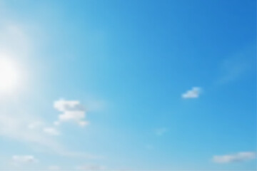 Bright blue sky with fluffy white clouds on a clear sunny day. Clear Sky And Few Clouds Background.