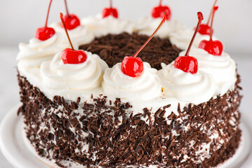 Black forest cake, Schwarzwald pie, dark chocolate and cherry, closeup. Vegan food, sugar, lactose and gluten free.