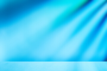 Abstract Blue Background with Gradient Light Beams and Surface