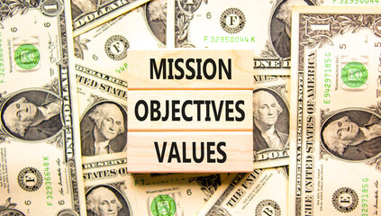 Mission objectives values symbol. Concept words Mission Objectives Values on beautiful blocks....
