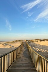 Wooden boardwalk over the coastal sand dunes near Espinho, Aveiro, Portugal, January 2024