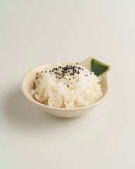 Soft Cooked Rice in a Small Bowl with Black Sesame Seeds Garnish