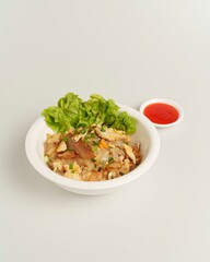 Delicious Asian Dish with Rice Noodles, Meat, Vegetables, and Sauce