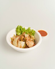 Fresh Vegetable Salad with Spicy Sauce and Crisp Lettuce Garnish