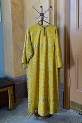   Konevets Island, Russia, July 13, 2024. Festive vestments of a priest.                           ...