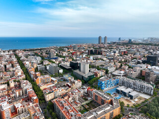 Fototapeta premium Geometric architecture heritage of country summer blue sea top view slide turn. Go Everywhere. Travel. Aerial view residential buildings city blocks and boulevards with green trees