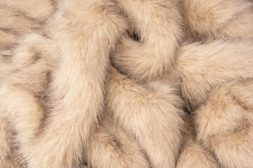 Texture of faux fur as a background, top view.