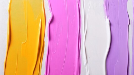 Naklejka premium Soft pastel tones of blush pink, lavender, and gold drips blending into one another on a textured canvas.