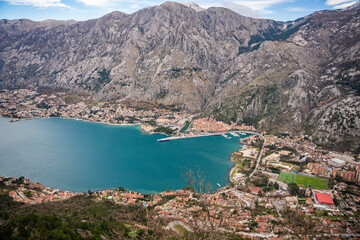 Obraz premium Panoramic view of Kotor town and Bay Boca from mountain view point in Montenegro in winter time