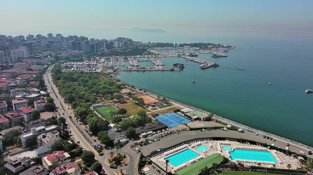 Istanbul, Turkey: Aerial view of famous Turkish city straddling Bosphorus Strait, summer day with clear blue sky - landscape panorama of Europe / Asia from above
