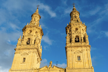 Fototapeta premium Twin bell towers of Santa Maria de la Redonda against a blue sky