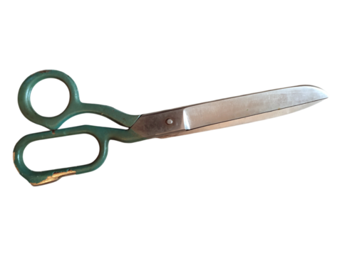 Vintage greenhandled shears isolated on white.  A classic design, suggesting themes of cutting, crafting, and nostalgia. Ideal for projects related to sewing, DIY, or historical imagery.