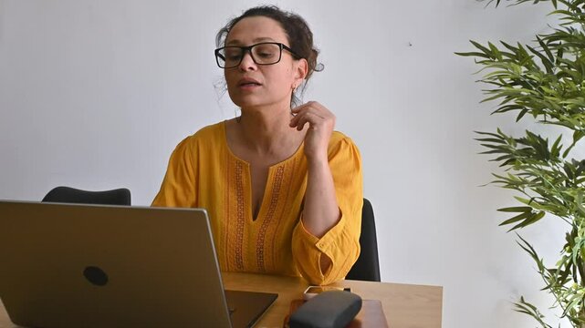Woman Working From Home on Laptop. Remote work and Digital nomade lifestyle 