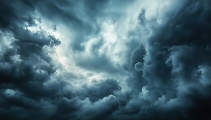 Fototapeta premium Stormy Sky Drama: Dark And Dramatic Clouds Fill The Sky, Creating An Atmosphere Of Impending Storm And Unpredictable Weather Conditions.
