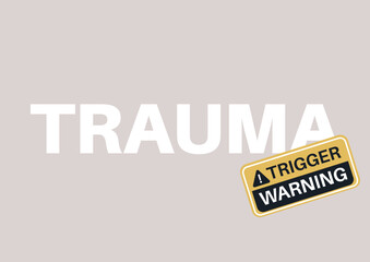 A sign featuring the word trauma and a bright trigger warning sticker prominently displayed on it, emphasizing the importance of mental health awareness and sensitivity in public settings