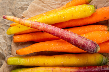 colorful carrots fresh vegetable tasty delicious gourmet food background table rustic food top view copy space keto and paleo diet vegetarian and vegan food