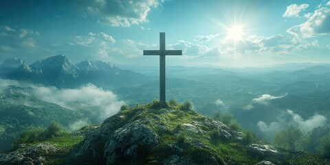 Naklejka premium Scenic mountain view with a cross on a rocky hilltop during sunrise in a serene landscape