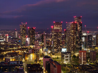 Illuminated Manchester City Skyline at Dusk with Modern Skyscrapers © jmh-photography