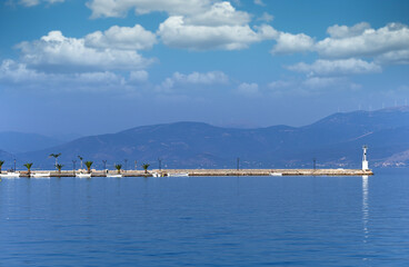 Naklejka premium Small white fishing boats in the harbor,Nafplio,Greece