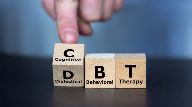 Cubes form the acronym CBT (Cognitive Behavioral Therapy) and DBT (Dialectical Behavior Therapy). 