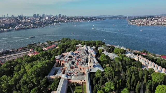 Istanbul, Turkey: Aerial view of largest Turkish city, famous historic landmark and museum Topkapi Palace (Topkapı Sarayı), sunny summer day - landscape panorama of Europe / Asia from above
