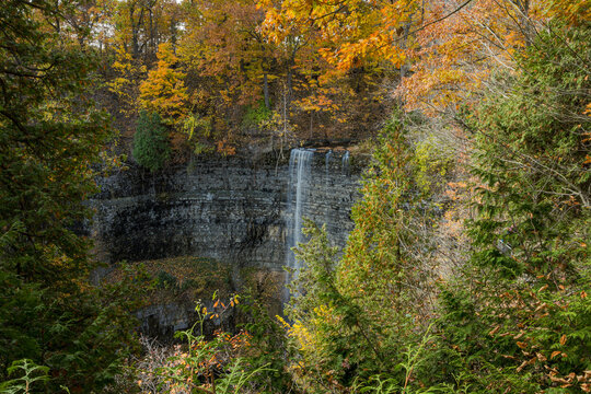 View of the Tews Falls, tallest waterfall in Hamilton, Ontario Canada, in Autumn. The water flow is minimal during this time.