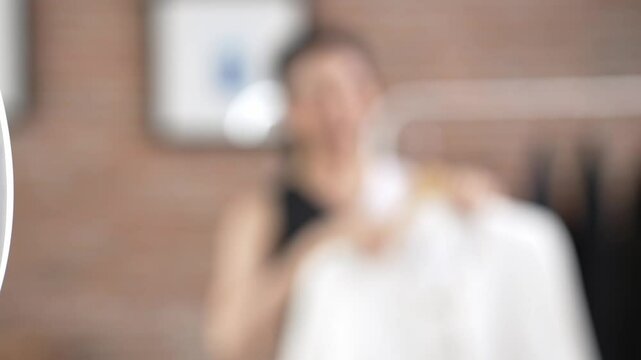 Rear view behide camera screen display woman influencer shoot vlog video review clothes prim social media or blog. Girl with apparel studio lighting for vivancy live streaming marketing recording