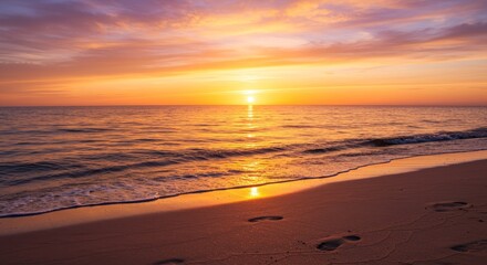 Obraz premium Peaceful Sunset Beach Footprints - Serene beach sunset, golden hour, footprints in sand, tranquil ocean, peaceful escape. Symbolizing peace, serenity, journey, memories, and hope