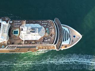 Aerial top view of cruise in summer vacation. Cruise ship tour and travel at sea. Aerial view of...