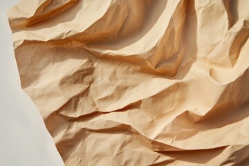 Crinkled brown paper texture, light and shadow interplay, abstract background.