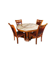 Full indoor shot of a round, marble-topped dining table with four matching chairs