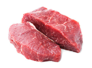 Pieces of raw beef meat isolated on white