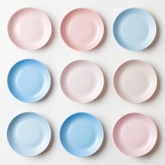 Nine pastel-colored plates arranged in a grid on a white background.