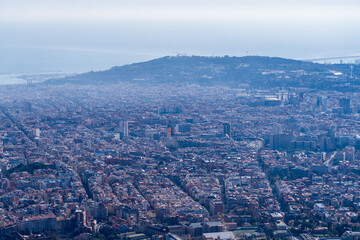 Barcelona, ​​Spain - February 3, 2025: Aerial view of the city. Cityscape Temple of the Sacred Heart, Tibidabo