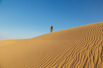 Man in the sand desert